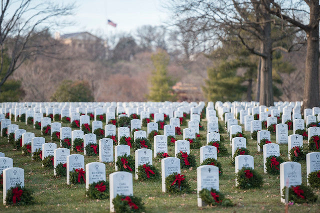 Wreaths laying on headstones